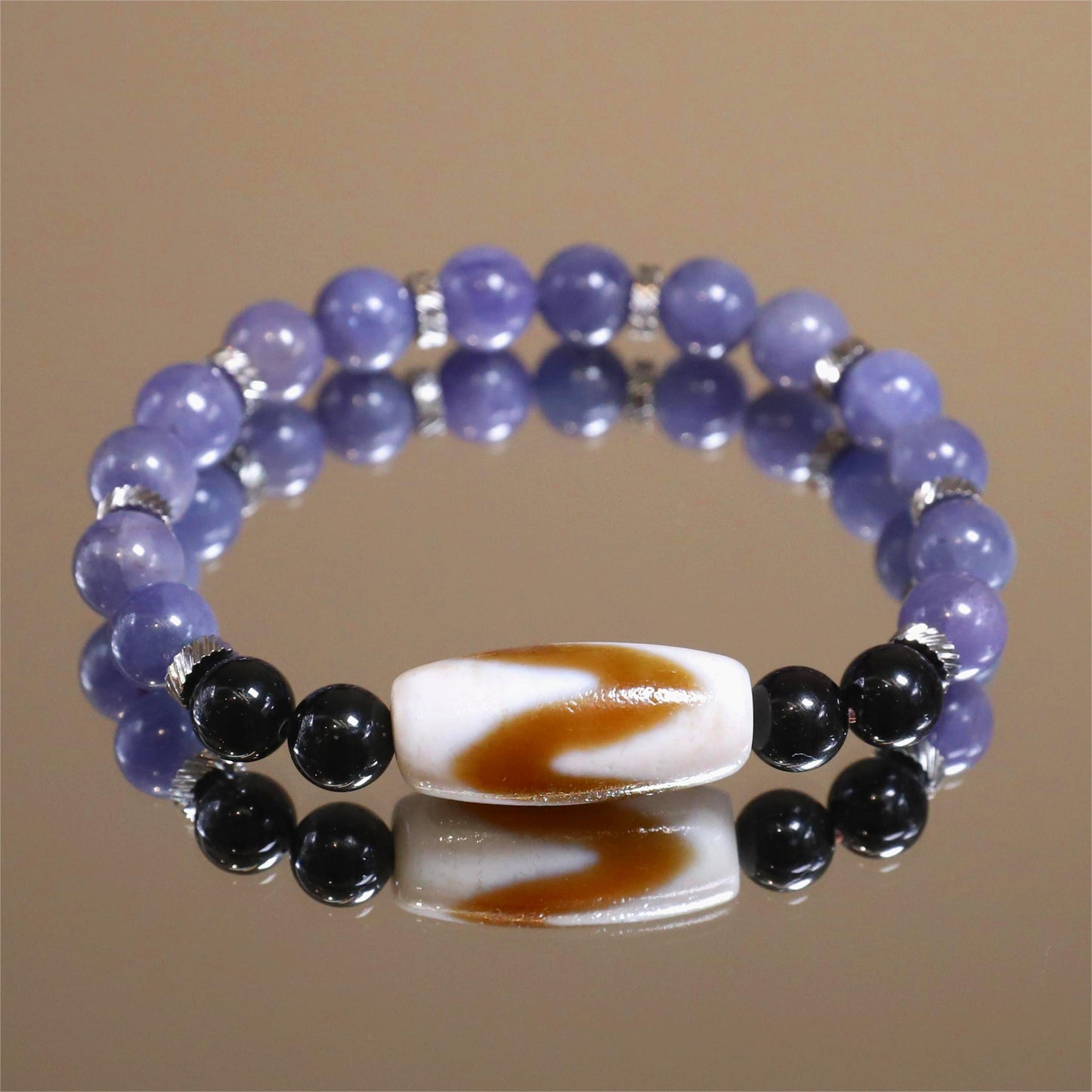 The Celestial Fang - Tanzanite + Tiger Tooth Dzi Bracelet
