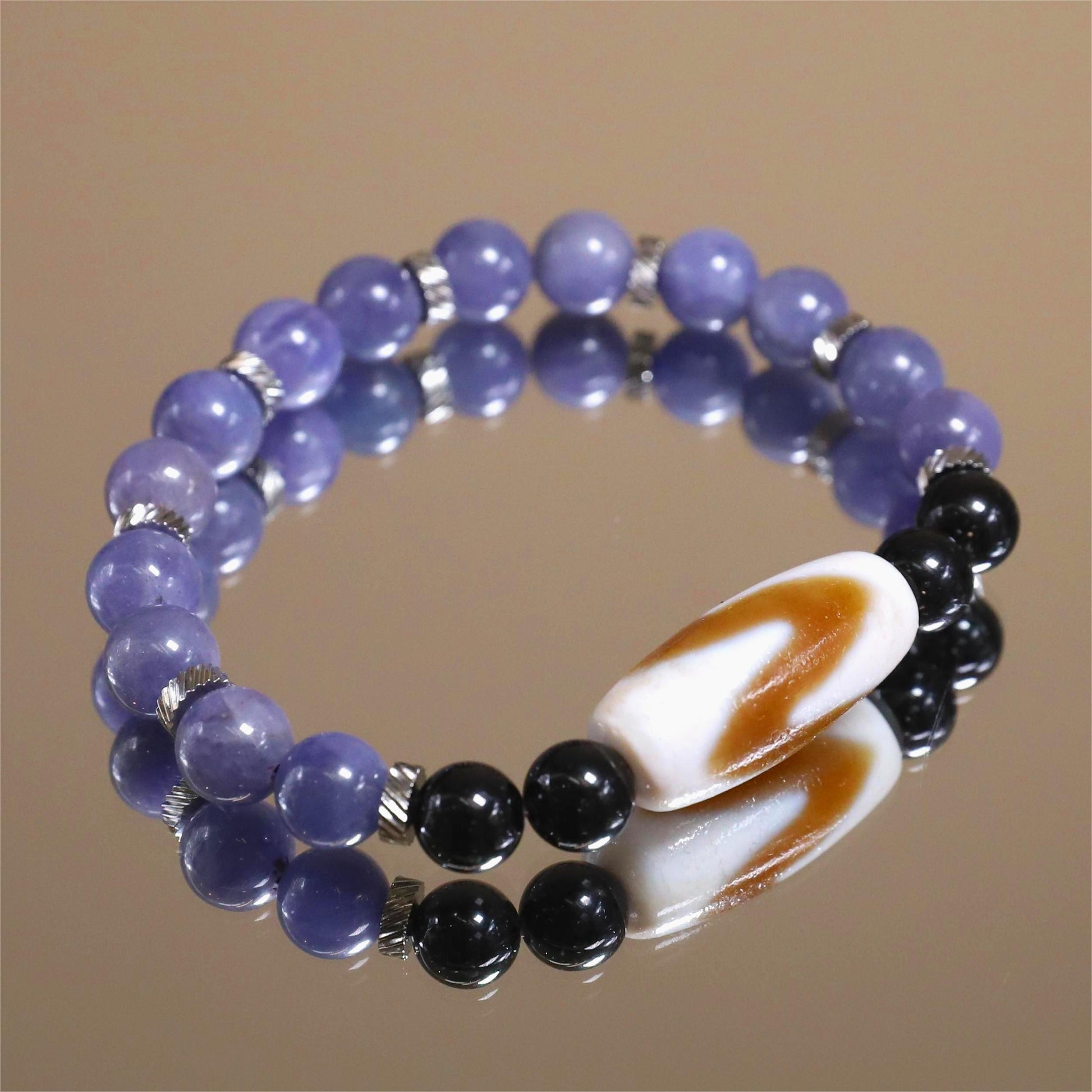 The Celestial Fang - Tanzanite + Tiger Tooth Dzi Bracelet