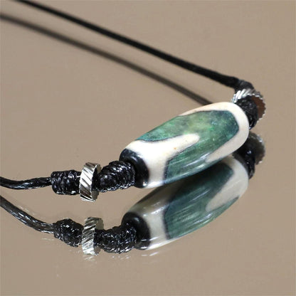 The Tiger’s Valor - Tiger Tooth Dzi Necklace